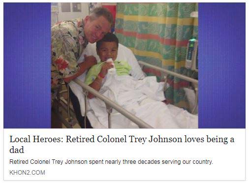 Retired Colonel Trey Johnson with a small boy