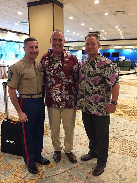 3 happy men smiling