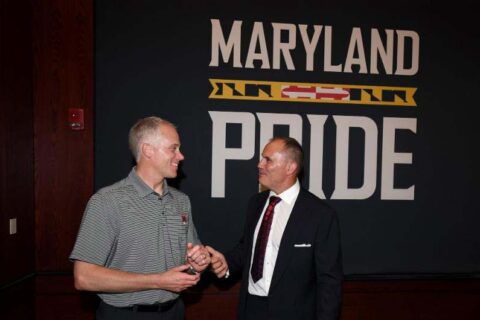 2 men talking in the Maryland Youth Impact Program