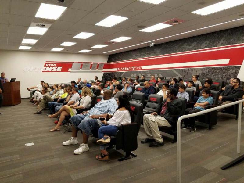 People sitting in the conference room and attending a conference