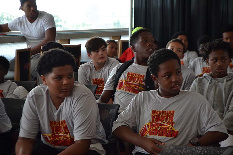 Boys listening to a session in the classroom