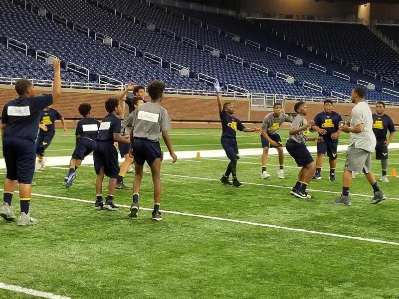 Boys playing in stadium