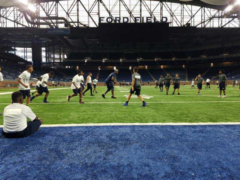 Boys playing in stadium