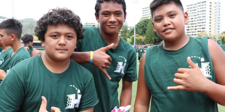 Football players posing for picture