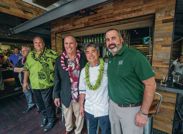 Kauai mayor Bernard Carvalho, left, Youth Impact Program founder Riki Ellison, Chef Roy Yamaguchi and Hawaii football coach Nick Rolovich