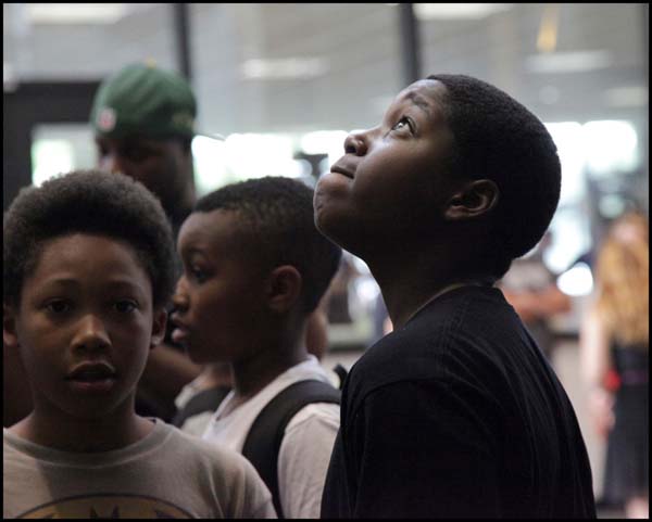 Student looking up to the ceiling 