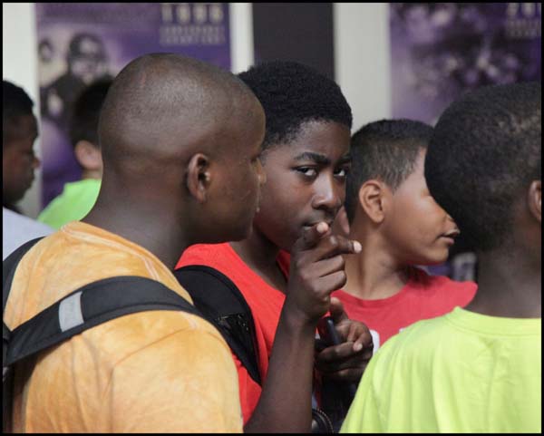 Student pointing finger to camera