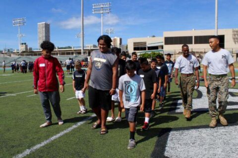 Coach taking students to the playground