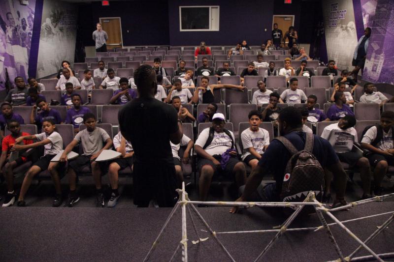 players sitting in the hall