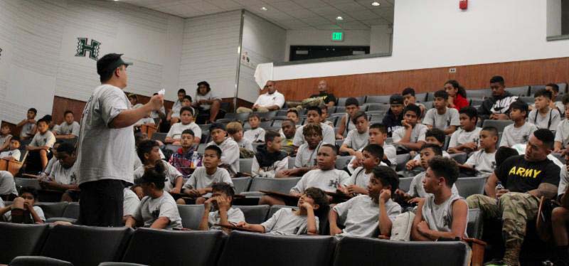 Man addressing students in the conference room