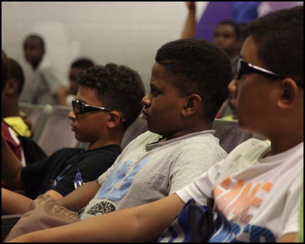 Students listening to lecturer in class