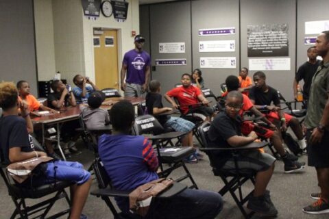 students learning something in a classroom