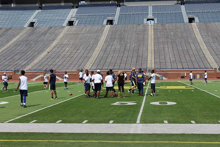 Players doing sports practice on the stadium ground