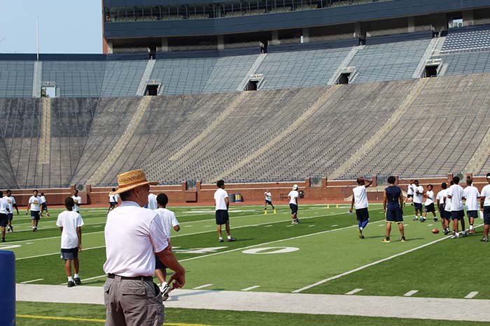 Players doing sports practice on the stadium ground