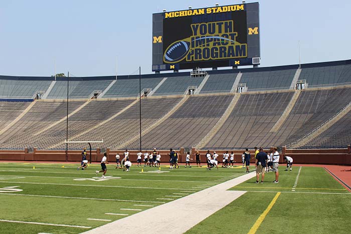 Boys doing sports practice on the stadium ground