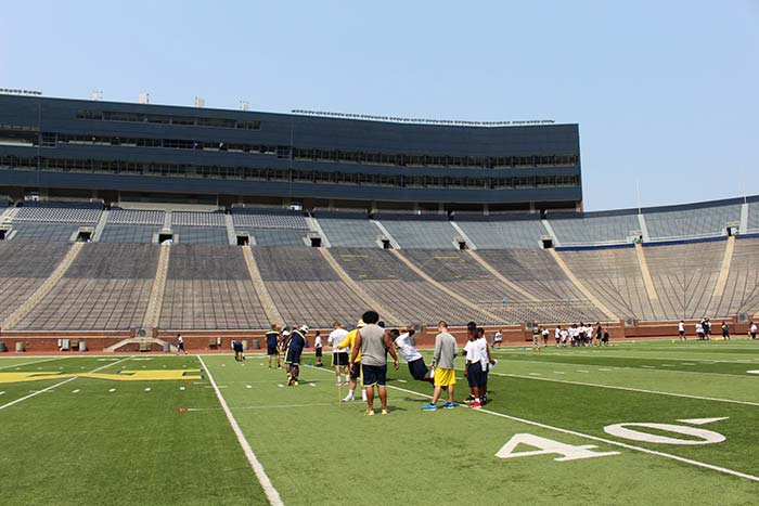 Boys doing sports practice on the stadium ground