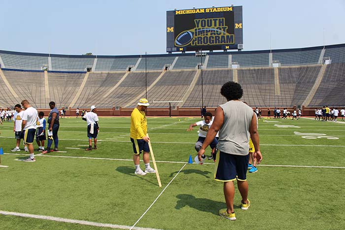 Boys doing sports practice on the stadium ground