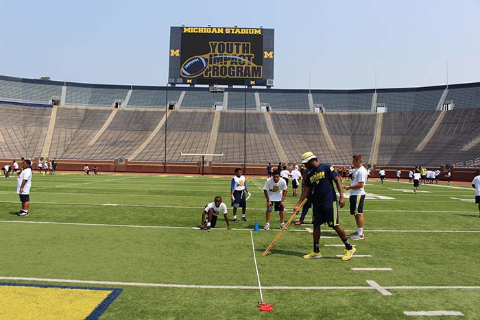 Boys doing sports practice on the stadium ground