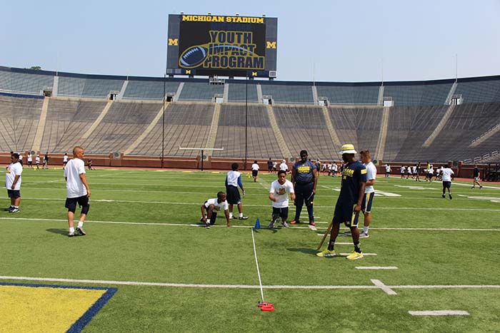 Boys doing sports practice on the stadium ground