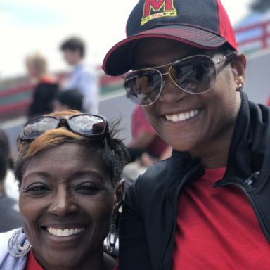 2 womens laughing and posing for the photo