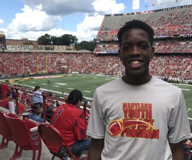 boy standing in the stadium