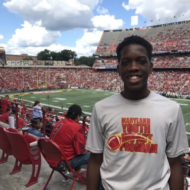 boy standing in the stadium