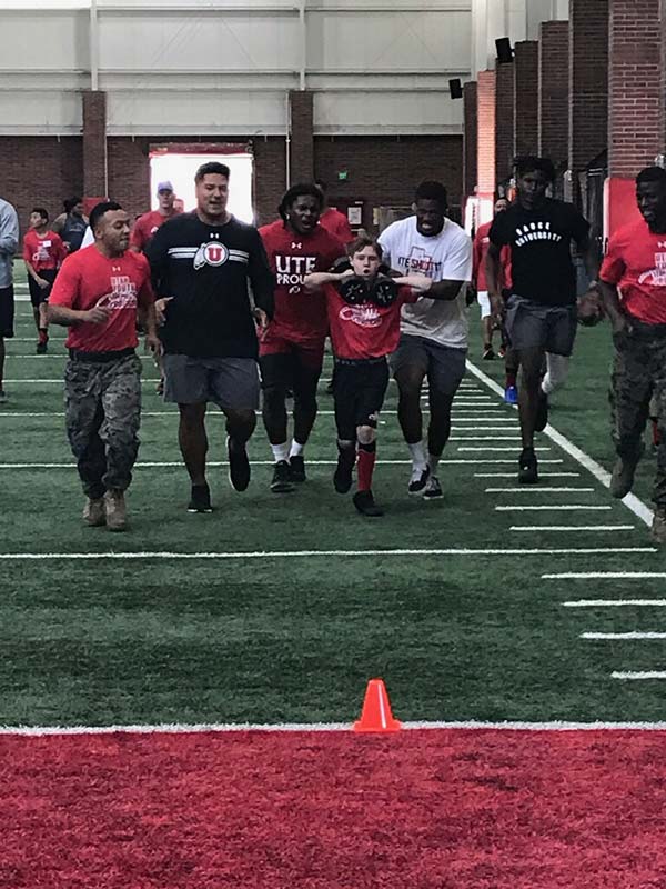 Boys running on the ground