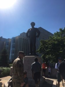 Statute near the buildings