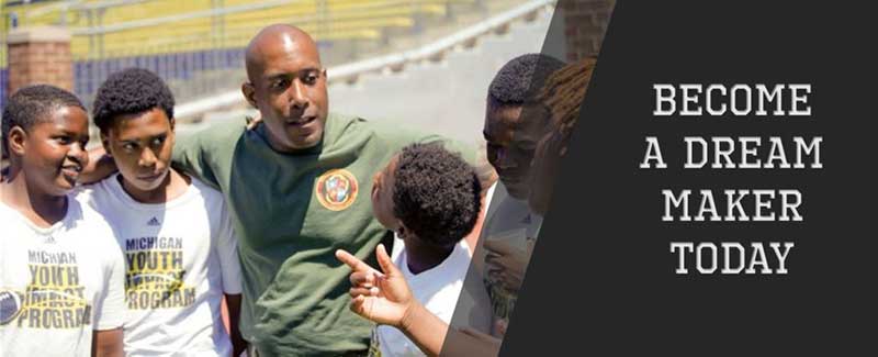 Coach with his students in the stadium