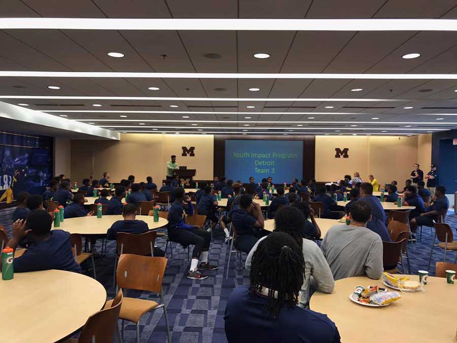 Students attending a session in the hall