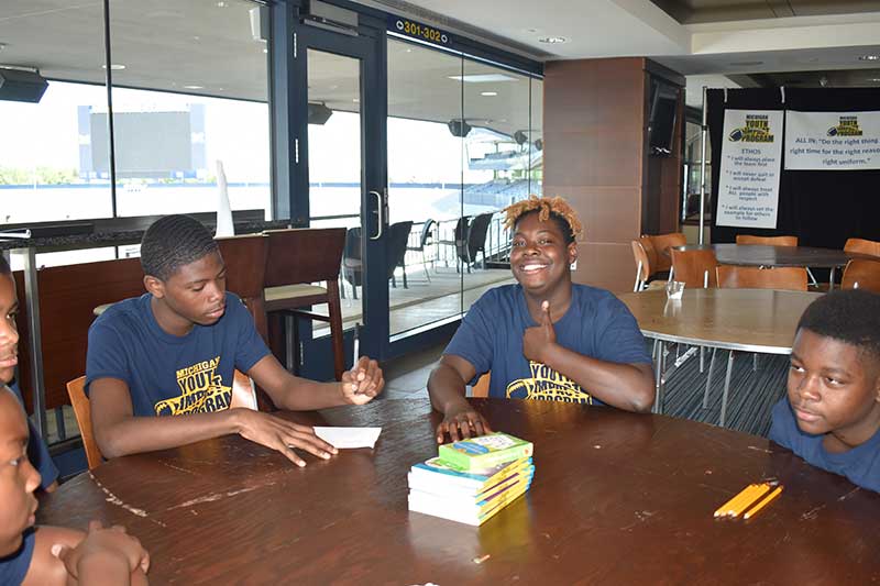 Students sitting around a table