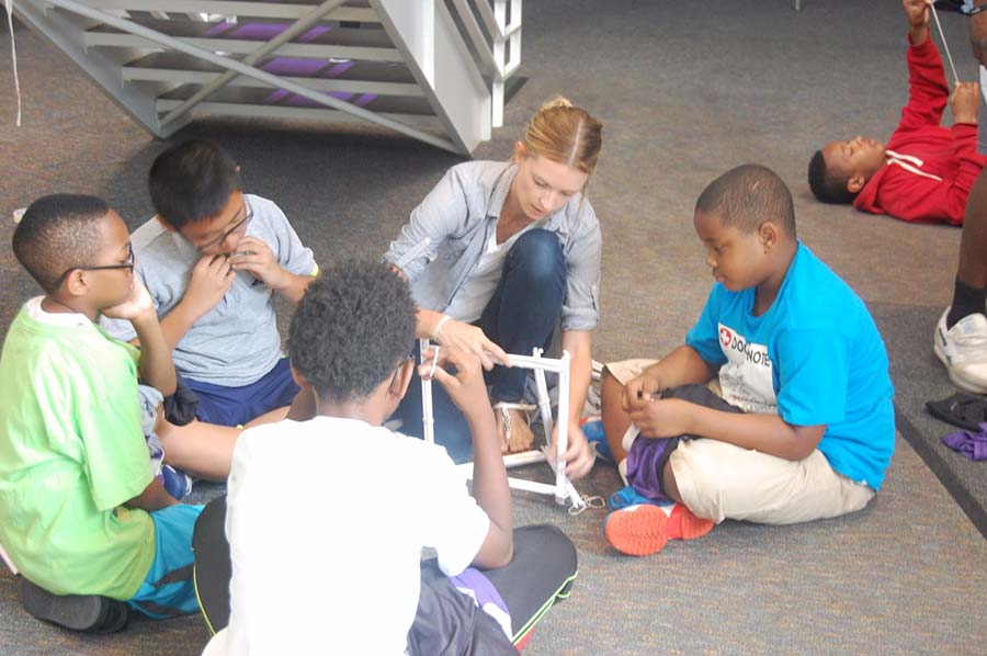 Students making cubic structure