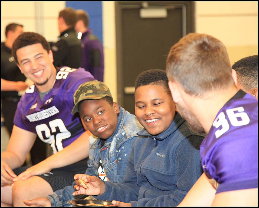 Coach talking with student