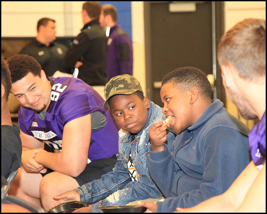 Coach talking with student