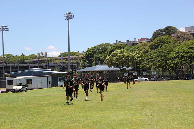 Boys running on the ground