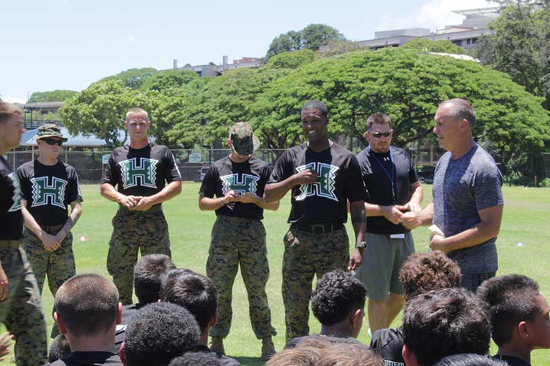 Instructor talking to players