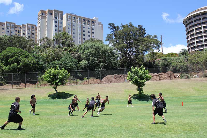 Boys playing on the ground