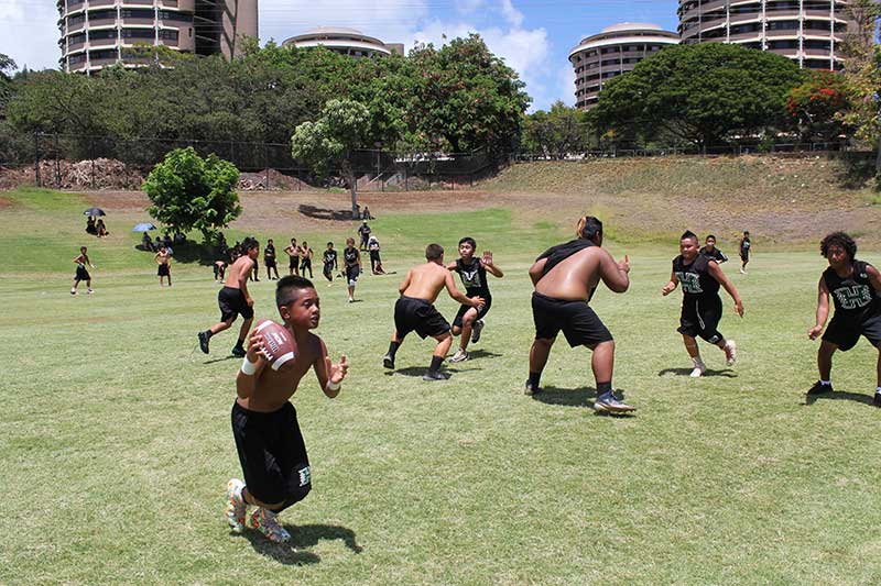 Boys playing on the ground