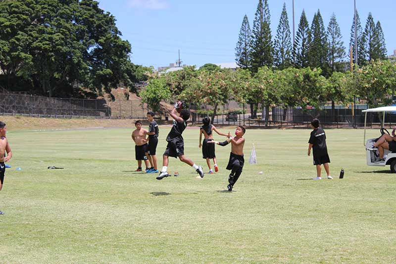 Boys playing on the ground