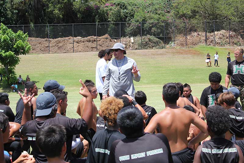 Instructor talking to players