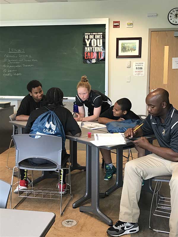 Students discussing on the study table