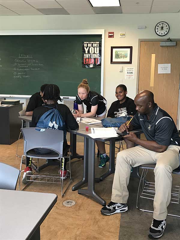 Students discussing on the study table