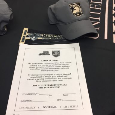 Letter of intent and cap beside a letter